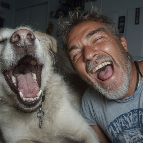 happy man and his dog yawning with mouths wide open